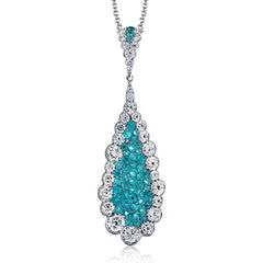 This pendant's stunning .50 ctw of blue paraiba instantly grabs all the attention in the room and is surrounded by 1.10 ctw of round brilliant white diamonds.