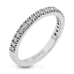 This beautiful 18k white gold wedding set contains a stunning .75 ctw of white round brilliant diamonds.