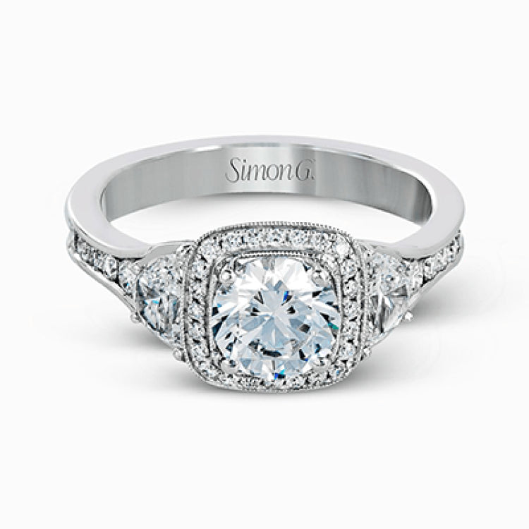Featuring a lovely contemporary design, this white gold ring is complemented by a halo of .28 ctw round cut white diamonds and accented with .44 ctw moon shaped diamonds.