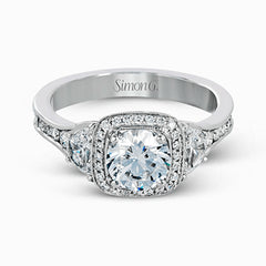 Featuring a lovely contemporary design, this white gold ring is complemented by a halo of .28 ctw round cut white diamonds and accented with .44 ctw moon shaped diamonds.