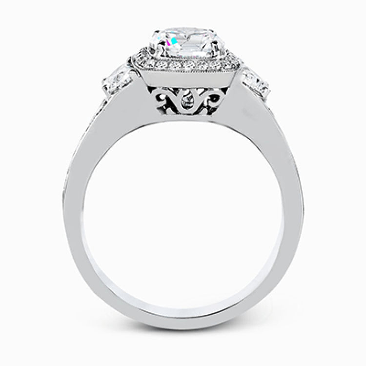 Featuring a lovely contemporary design, this white gold ring is complemented by a halo of .28 ctw round cut white diamonds and accented with .44 ctw moon shaped diamonds.