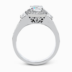 Featuring a lovely contemporary design, this white gold ring is complemented by a halo of .28 ctw round cut white diamonds and accented with .44 ctw moon shaped diamonds.