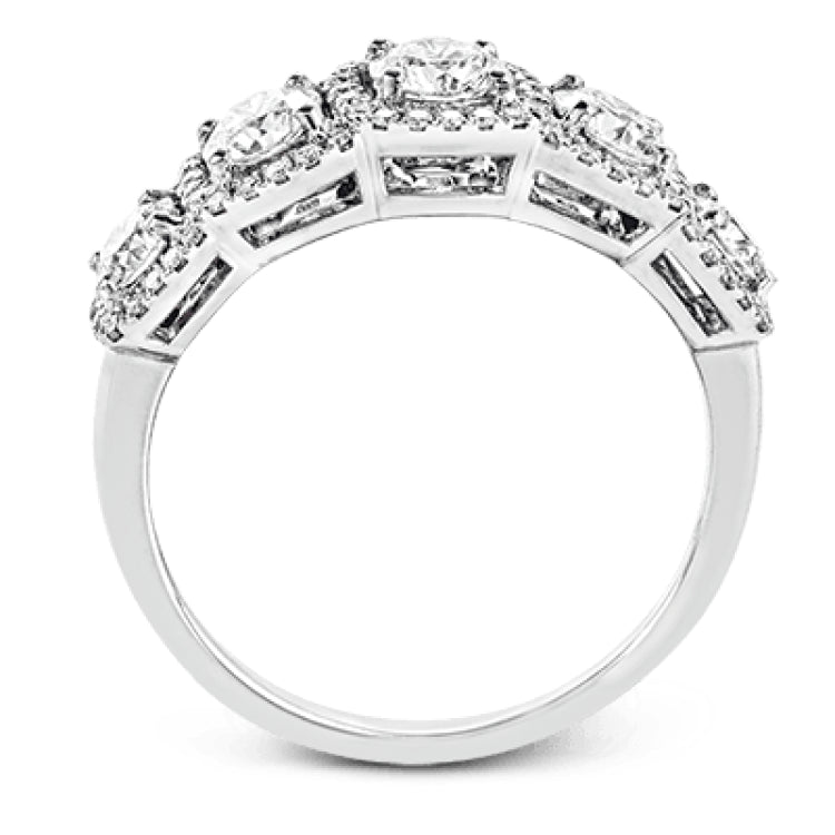 This eye-catching white gold modern band features multiple exquisite halos set with 1.33 ctw glistening round cut white diamond accents.