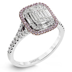 The modern style of this white gold ring is complemented by .48 ctw of glistening baguette cut white diamonds and .38 ctw of round cut white diamonds.