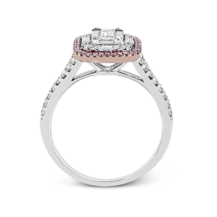 The modern style of this white gold ring is complemented by .48 ctw of glistening baguette cut white diamonds and .38 ctw of round cut white diamonds.