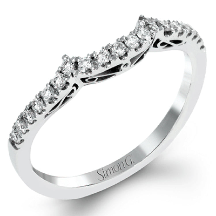 The delicate romantic design of this vintage inspired white and rose gold engagement ring and wedding band set is accentuated by .45 ctw of white diamonds and .08 ctw of pink diamonds.
