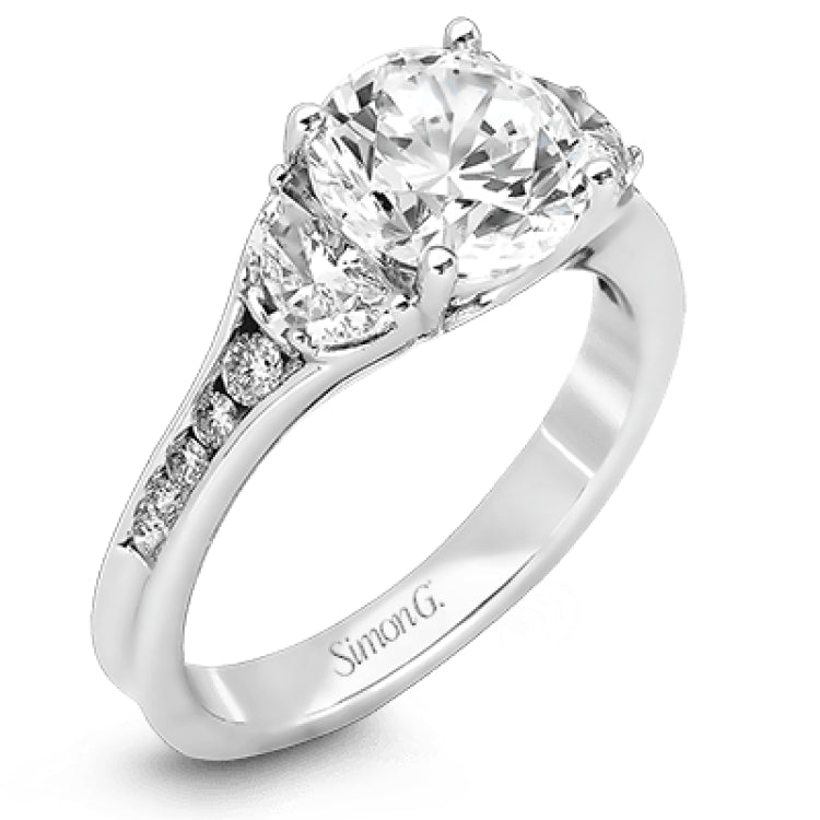This classically designed white gold ring is emphasized by .18 ctw of white diamonds and .51 half moon shaped diamonds to create a memorable setting.