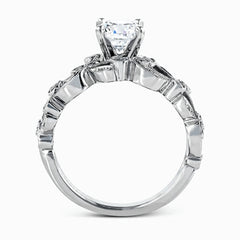 This delicate floral inspired white gold engagement ring and wedding band set is accentuated with .28 ctw shimmering round cut white diamonds.