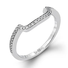 This vintage-inspired 18k white gold engagement ring is the perfect design for princess cut center stone because it has a detailed square shaped halo. The entire ring is set with .62 ctw of white diamonds.