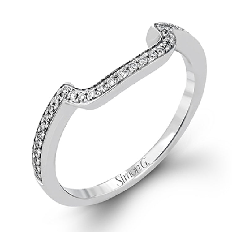 This vintage-inspired 18k white gold engagement ring is the perfect design for princess cut center stone because it has a detailed square shaped halo. The entire ring is set with .62 ctw of white diamonds.