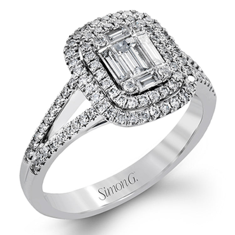 The modern style of this white gold ring is complemented by .44 ctw of glistening baguette cut white diamonds and .36 ctw of round cut white diamonds.