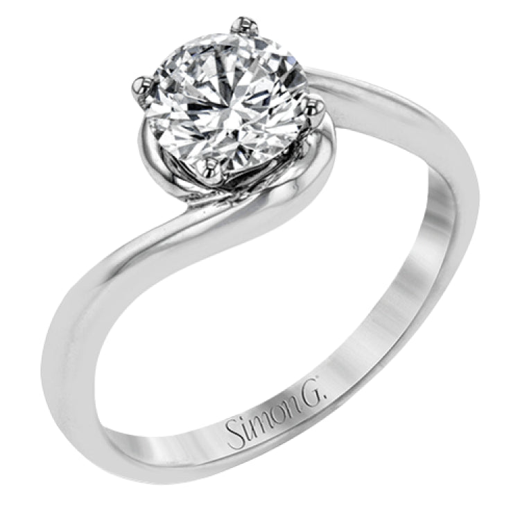 This beautiful contemporary design in white gold combines simplicity and a gracefully curved shank to accentuate a single, central stone.