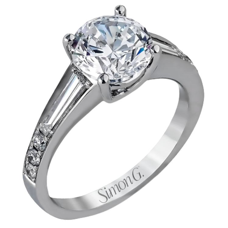 Contemporary in its design, this white gold engagement ring features .17 ctw of round cut white diamonds highlighted by .50 ctw of tapered baguette cut side diamonds.