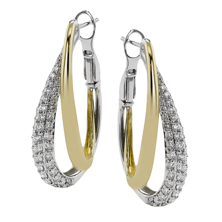 This stunning two-tone earring consists of a yellow gold hoop intertwined with a white gold diamond encrusted hoop 0.87 ctw.