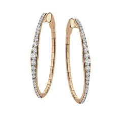 A fresh take on the diamond hoops in 18K rose gold 1.11 ctw, they taper at the ends and feature larger diamonds in the center graduating to small towards the ends.