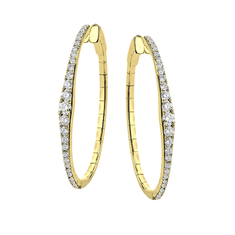 A fresh take on the diamond hoops in 18K yellow gold 1.11 ctw, they taper at the ends and feature larger diamonds in the center graduating to small towards the ends.