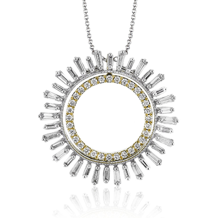 Make a statement with this two in one diamond pendant that features an inner circle of RD diamonds 0.26 ctw. set in yellow gold, with an outer orb of baguettes 1.04 ctw. in white gold