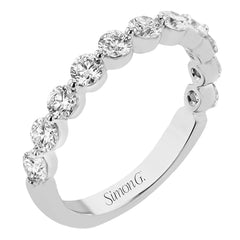 A modern design with a bubble setting that highlights each individual stone in this diamond wedding band 1.0 ctw.