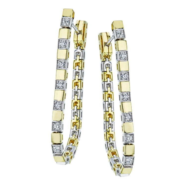 These versatile earrings can be worn in two ways, transforming from a line of diamonds into soft hoops. They're perfect for going from day to night.