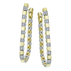 These versatile earrings can be worn in two ways, transforming from a line of diamonds into soft hoops. They're perfect for going from day to night.