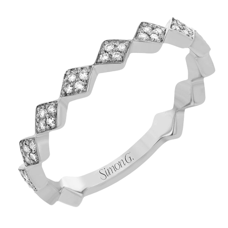 From our stackable collection this geometric shaped ring in 14 Kt white gold has a 0.24 ctw diamonds and a bit of whimsy