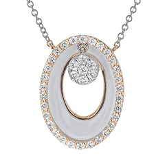 A modern circle, this 18k white and rose gold pendent features .34cttw diamonds and white enamel.