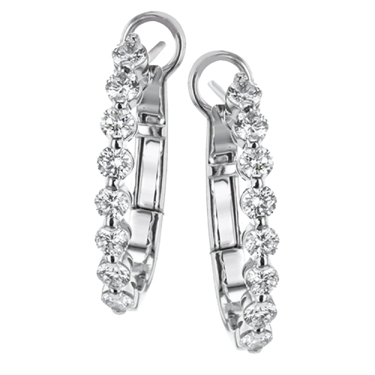 A STAPLE IN ANY JEWELRY WARDROBE, THESE 18k WHITE GOLD HOOPS FEATURING 1CTTW ROUND DIAMONDS  MOVE PERFECTLY FROM DAY TO NIGHT.