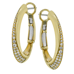 These dynamic 18k yellow gold hoop earrings contain .27 ctw of white diamonds along the exterior of their distinctive shape.