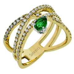 This modern right hand ring crafted in 18K gold features .61cttw white diamonds and a .39ct emerald.