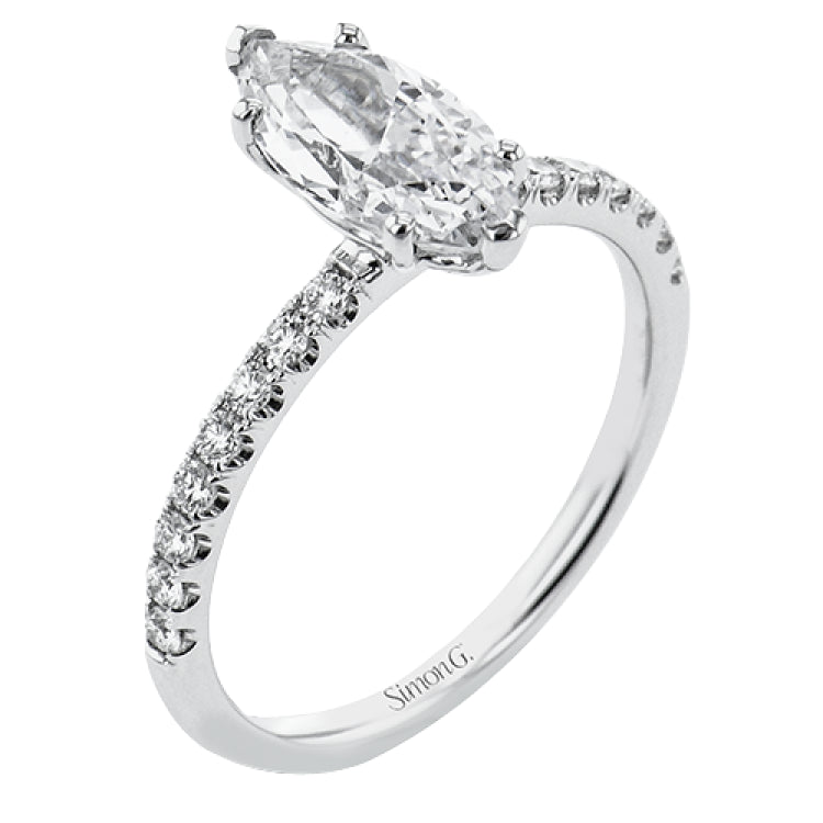 This distinctive bridal set design features a double-layer wedding band that fits around the engagement ring. The set contains .77 ctw of white diamonds.