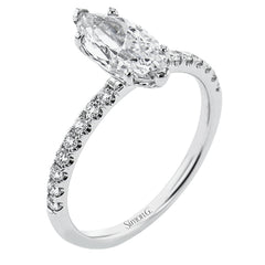 This distinctive bridal set design features a double-layer wedding band that fits around the engagement ring. The set contains .77 ctw of white diamonds.