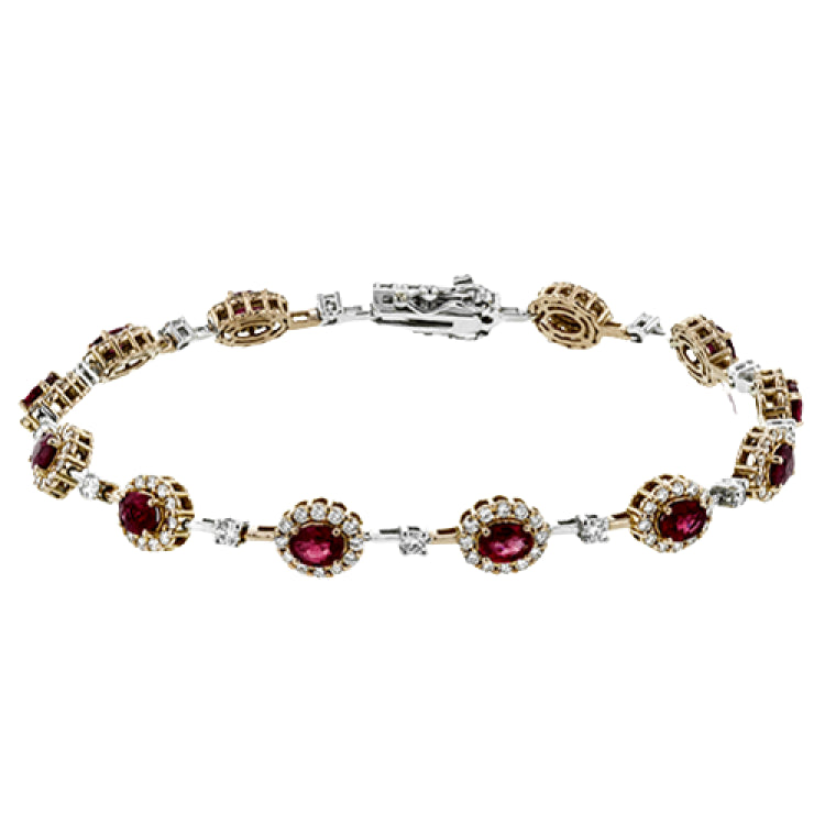 This 18K rose gold bracelet features 2.0 ctw of oval Rubies each surrounded by white diamonds 1.44 ctw., 7
