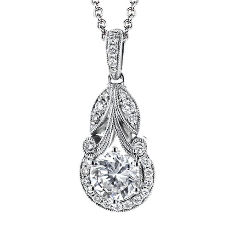 This classic, elegant white gold pendant features .16 ctw of round white diamond accents in a vintage-inspired setting.