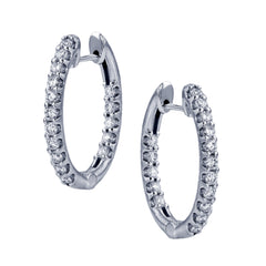 These elegant white gold earrings feature 1.95 ctw of white diamonds