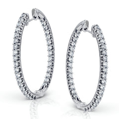 These classic white gold earrings sparkle with an impressive 1.96 ctw of white diamonds