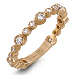 This lovely 18k rose gold band showcases varied sizes of round white diamonds that total .30 ctw. Perfect for stacking.