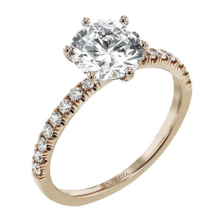 This distinctive bridal set design features a double-layer wedding band that fits around the engagement ring. The set contains .77 ctw of white diamonds.