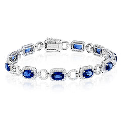 This 18k white gold bracelet is an instant heirloom with 9.06 ctw of blue sapphires and 2.21 ctw of round brilliant white diamonds.