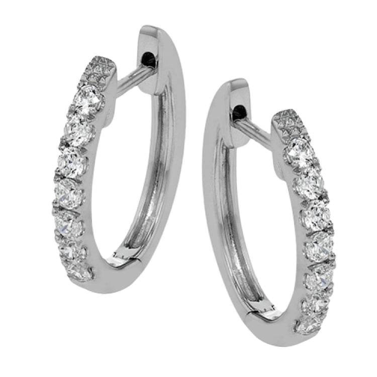 These classic 18k white gold hoop earrings would be perfect to wear every day, set with .39 ctw of white diamonds.