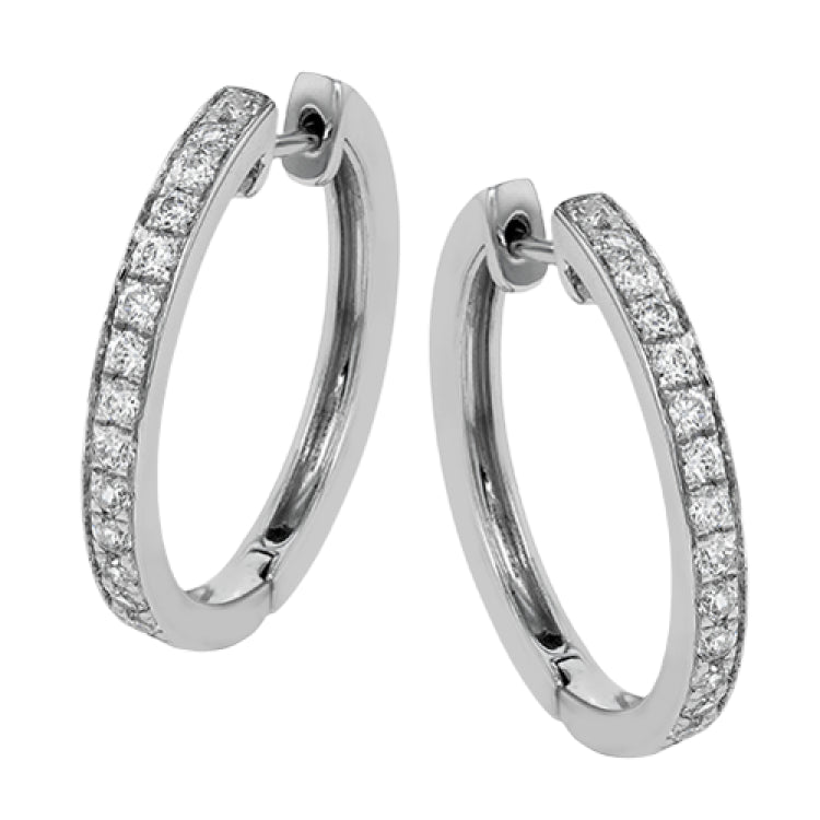 These medium-sized hoop earrings feature .50 ctw of white diamonds and are crafted from 18k white gold.