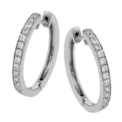 These medium-sized hoop earrings feature .50 ctw of white diamonds and are crafted from 18k white gold.