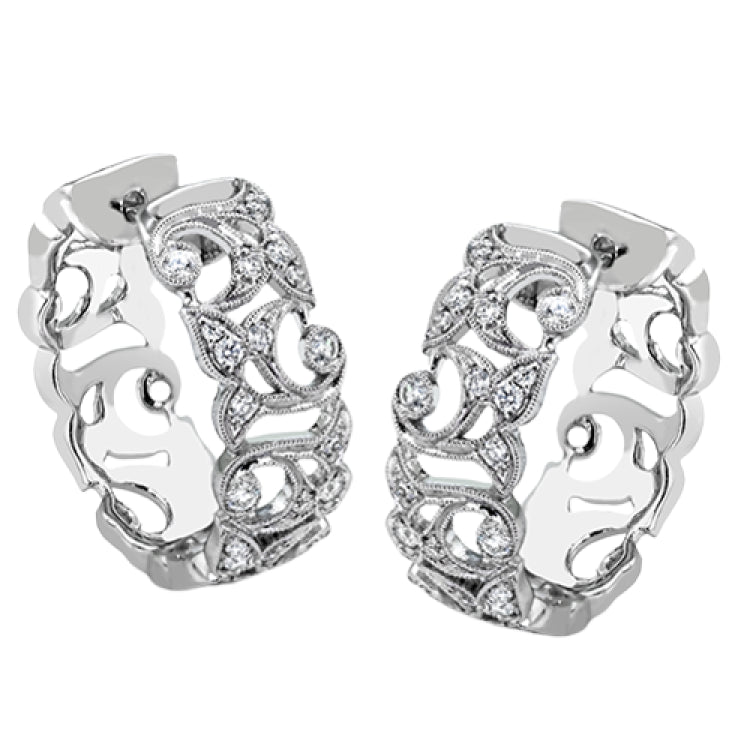 These traditional white gold hoop earrings reflect a romantic floral openwork design accented with .37 ctw of shimmering white diamonds.