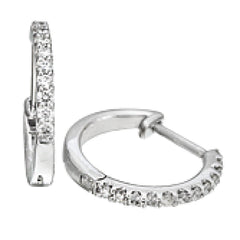 Featuring a classic hoop style with modern accents, these sparkling white gold earrings are accentuated by .17 ctw of round cut white diamonds.