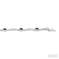 4X3 MM Pear Cut Sapphire and 1/20 Ctw Round Cut Diamond Precious Fashion Bracelet in 10K White Gold