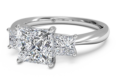 RITANI Three-Stone Diamond Engagement Ring with Princess-Cut Side Diamonds in White Gold